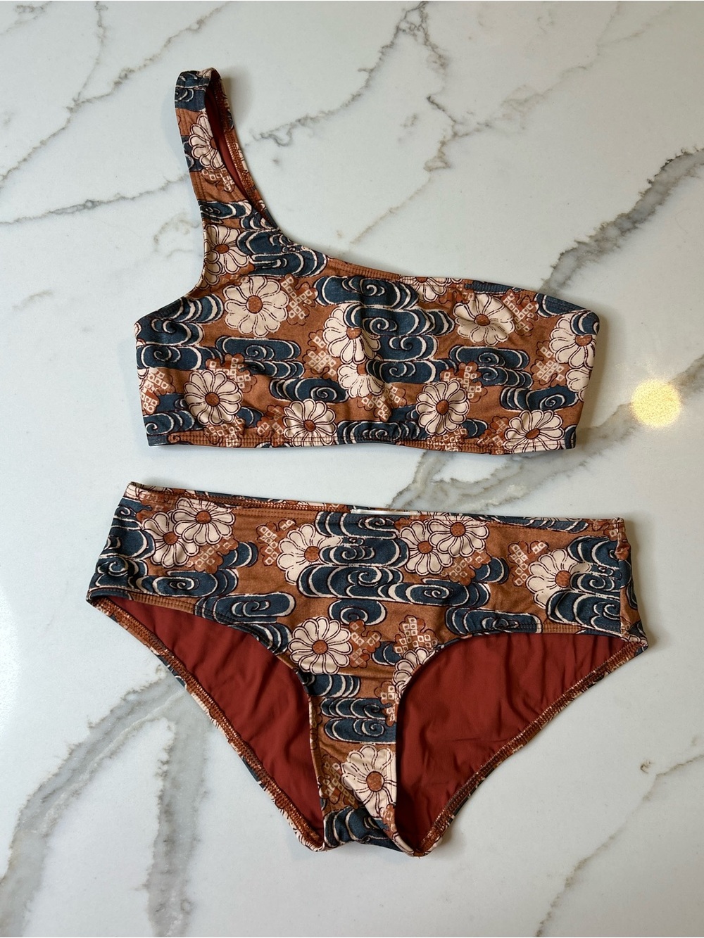Ulla Johnson One-Shoulder Floral Wave Bikini in Rust, Navy & Cream